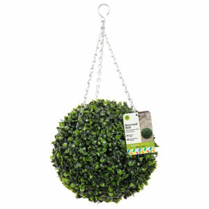 A spherical green artificial boxwood topiary hanging from a silver metal chain with a hook, featuring a product tag attached.