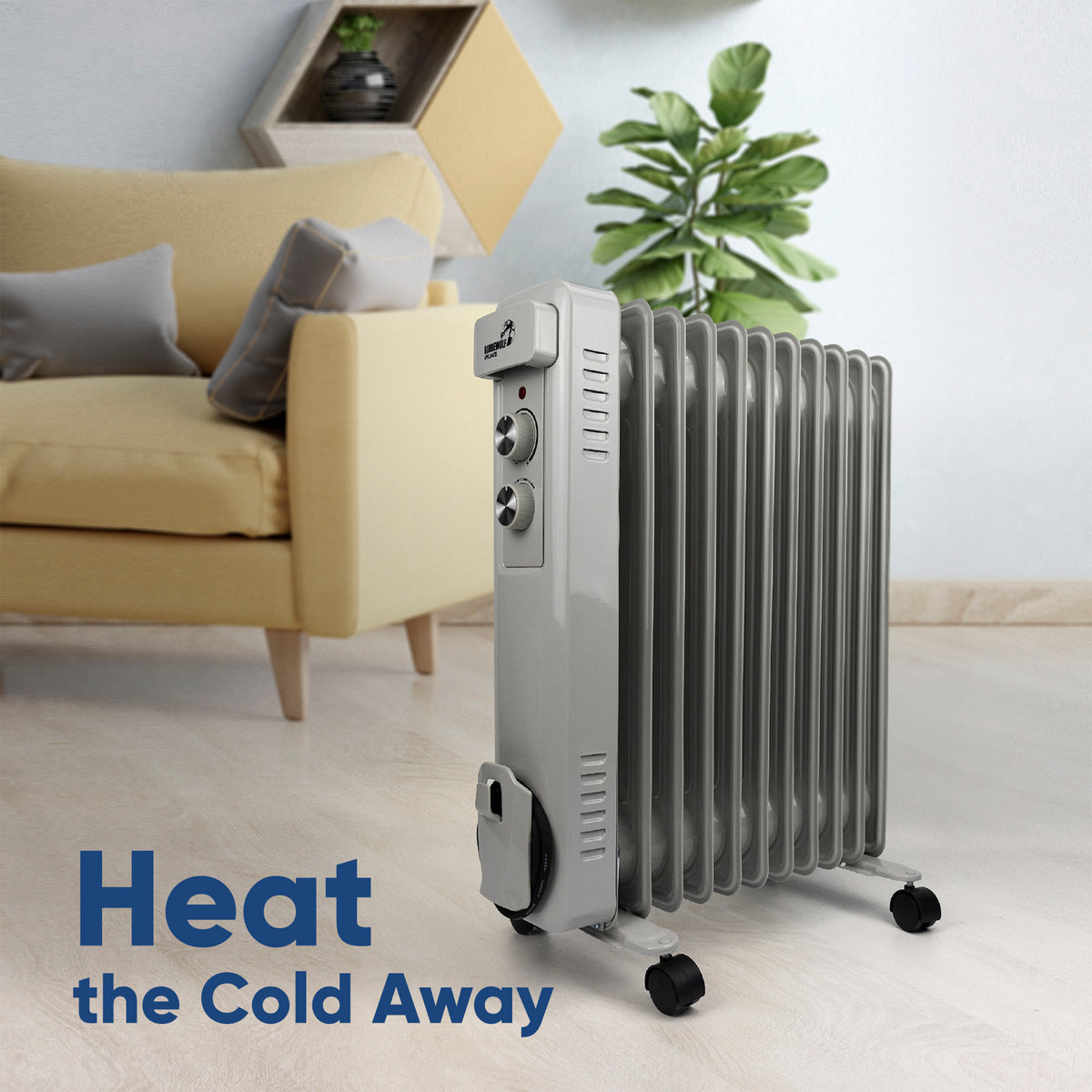 A silver 14-channel oil radiator heater with black wheels, shown in a modern living room setting next to a yellow sofa and a green plant. The text 'Heat the Cold Away' is displayed in blue at the bottom left.