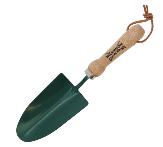 A small gardening hand trowel with a dark green metal blade and a light wood handle featuring the Wilksom Garden Co. logo, complete with a brown carrying loop at the end, shown on a plain white background.