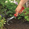 WOLF-Garten KA2K Multi-Change® Small Crumbler with red and yellow 7cm steel head and curved tines, shown on soil bed