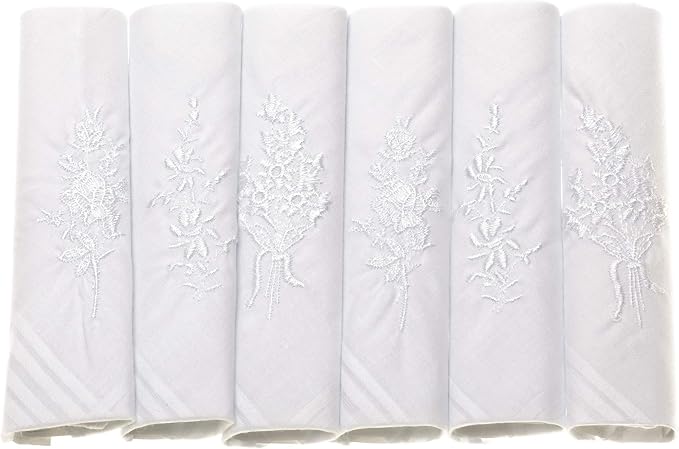 Six white embroidered handkerchiefs with floral lace patterns, arranged side-by-side against a white background.