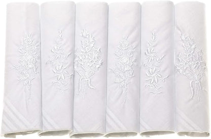 Six white embroidered handkerchiefs with floral lace patterns, arranged side-by-side against a white background.