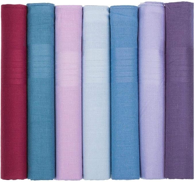 Seven rolled fabric swatches in vertical stripes of deep red, teal blue, light pink, pale blue, medium blue, lavender, and dark purple on a white background.