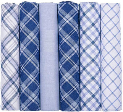 Six rolled fabric handkerchiefs or pocket squares arranged side by side, featuring various plaid and checkered patterns in shades of blue, navy, and white.