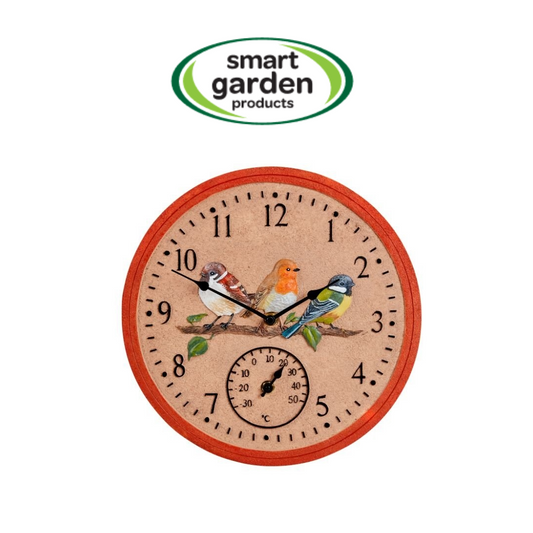 A round wall clock with a reddish-orange wooden frame, a light beige face, black Arabic numerals, bird illustrations, and a small inner temperature dial. A green and white 'smart garden products' logo is shown above the clock on a plain white background.
