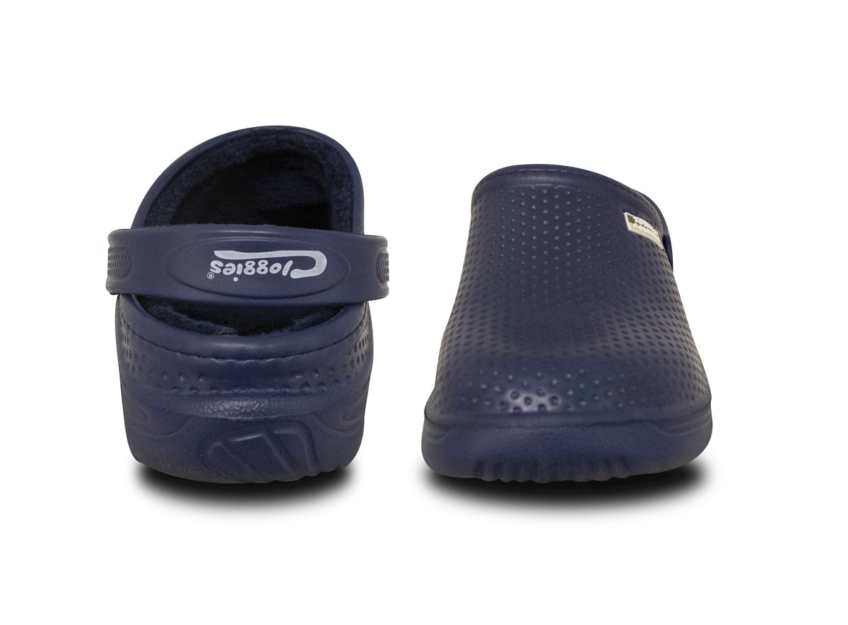 A pair of navy blue Croc style clogs shown from the back, featuring a textured sole, a perforated upper, and a strap with the cloggies logo.